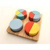 Dřevěné vkládací puzzle ze setu hlavolamů a skládaček